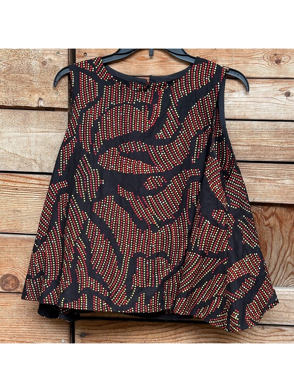 Sleeveless Black Top with Red and Yellow Dot Pattern